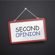 second opinion hanging sign isolated on black wall